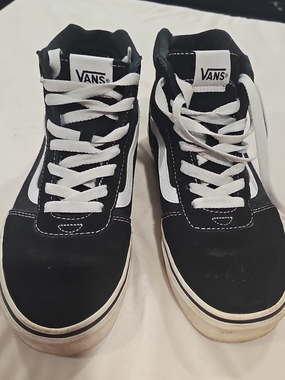 Vans Black and White High-Top Skate Sneakers